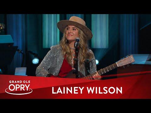 Lainey Wilson performing at the Grand Ole Opry